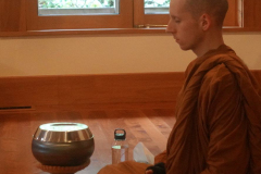 A soft pre-dana stillness.