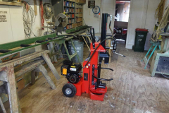 As part of our move to increase the use of wood for heating we now have a shiny red log splitter.