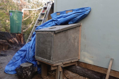 The concrete wood stove box on the side of the new monk kuti waiting for the flue - and the stove.