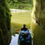 Venerable Aruno quietly contemplates the main flow of the river from a side inlet.