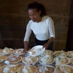 Dishes of rice being prepared for the pindapat.