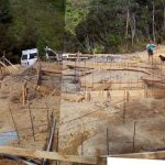 A collage of the site at the start of construction.