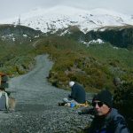 Lunch at base camp. Mt. Taranaki in the distance.