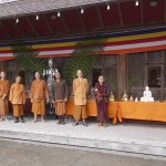 The Sangha in front of the Buddha rupa tables - ready for Songkran.