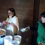 Orada and Yee preparing offerings.