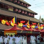 Lights and lanterns and so many people in white. There is a pervasive feeling of celebration.