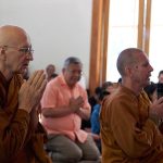 Ajahns Viradhammo and Kusalo add their voices to the chanting.