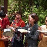 Ajahn Natawat receiving alms.
