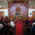 The Sangha chants blessings.