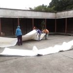 The NEW cloister canopy is unfurled for the first time. Which way is up?