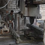 After the conference it was down to serious moonstone business. A big stone saw at the factory.