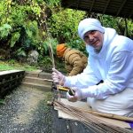 Anagarika McBain tries his hand at making a broom.