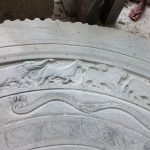 The stupa entry moonstone taking shape. Solid granite!