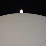 The spire is lost against the sweeping mass of the dome.