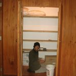 The old book store cupboard - now the bedding store. Lindsay rebuilds the shelves to suit.