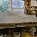 Bruce with a plywood model of the reclining Buddha rupa; the marble reality to be installed on the west-side of the stupa.