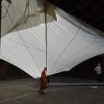 The canopy edges are secure and all is ready to raise the pole.