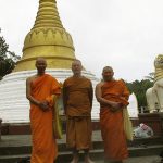 Ajahn Samachai (Nelson - L.) and Samath (Auckland - R.) making a tour of the monastery with ajahn Kusalo.