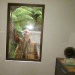 Replete with halo (lens flare?) Ajahn Narado giving the office window a good clean.