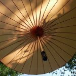 A finished umbrella (glot) hanging out to dry.