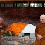 Stupa dedication: the rupa is unveiled relics (center) ready to be interred.