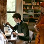 Ajahn Joe introducing Ryan to the noble art of sewing.