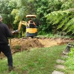 Clearing a platform for Aunty Suans new kuti in the lay resident zone.