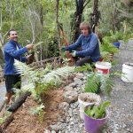 Beat and Paul begin planting in the newly formed garden.