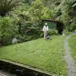 Paul keeping on top of the quickly growing lawn.
