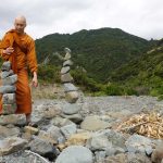 Tudong: Rock balancing meditation.