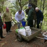 Preparing for vassa; gravel being taken to surface Ajahn Kusalos access track.