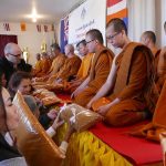 Robes being offered at the Thai temple in Newlands as a part of their Kathina.