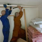 James and Ajahn Jo carefully removing scotia from the Garden kuti. The space is changing. The stepped floor left will be removed and the whole on one level.