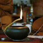 Earth air fire and water. The Sangha chants blessings.