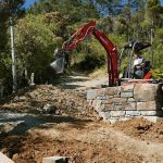 The stupa forecourt is leveled and the road landscaped all ready for surfacing.