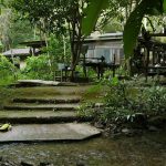The bowl washing area (foreground) with the kitchen (mid-ground) and sala - you can see the sala bell on the left corner.