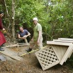 Sunyo Cristian and Daniel preparing the foundations for the memorial grove pavilion.