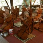 Ajahn Kusalos last full day in Thailand was the new moon observance. The 3 nearest monks are from the sister monastery (see umbrella photo). A very auspicious end to an inspiring and fruitful trip.