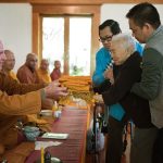 Khun Tho and her family have been long-term monastery supporters. Offering the forest-cloth is a fitting symbol of her dedication.