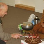 Bruce cuts a 65 year old cake - him not the cake. Another milestone another day another dana... one step closer to nibbana!