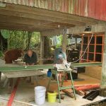 Venerable Issaro and Bruce working on the new dormitory.