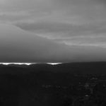 Winter is here. A dark cloud mountain hangs over Stokes Valley.