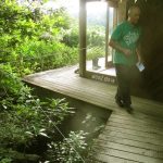 The hermitage kuti will get an upgrade before winter. Extended safer deck + wood stove. Bruce taking a few measurements.