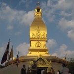 Venerable Aruno in front of Luang Por Chahs chedi.
