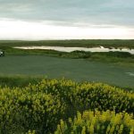 Tudong: our first night on the west coast. Estuary in foreground and sea over the dunes. This is just before the rain.