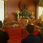 The sangha chant blessings.