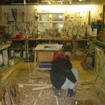 Lyndsay braving the cold of the workshop to finish crafting his lovely sign roof.