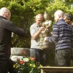 The buddha rupa is finally installed atop the beautiful stone plinth.
