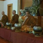 The Sangha assembled ready to begin the Magha puja ceremonies.