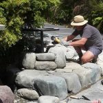 Simon working on the last stages of the plinth that will support the shiny buddha rupa.